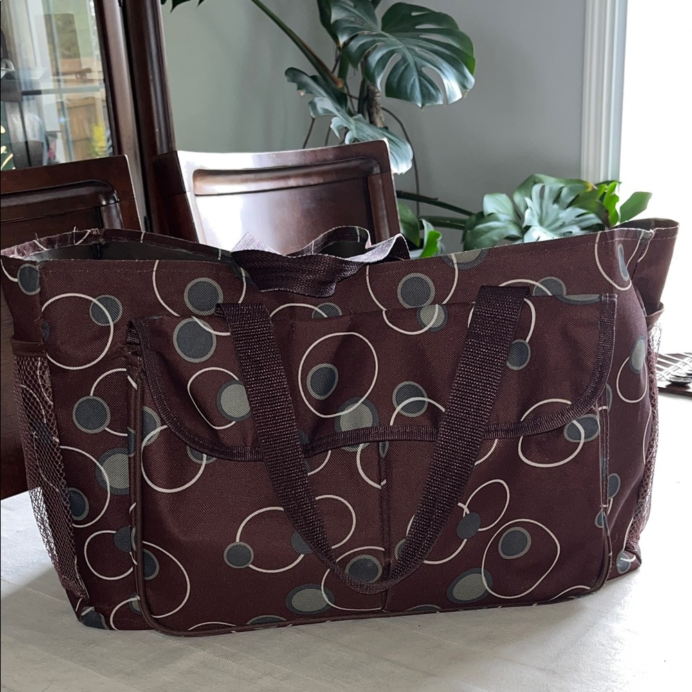 All purpose Brown Polka Dot Vinyl Tote Bag 
Open at top with side pockets.